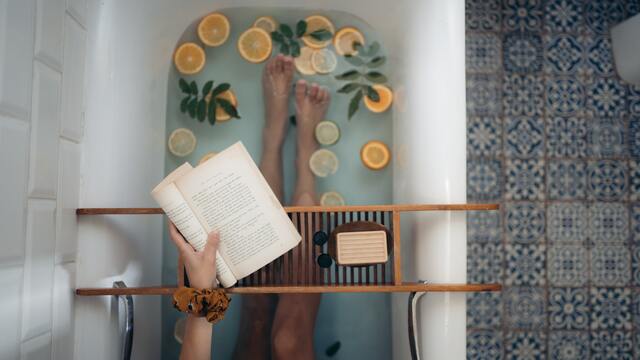 Bath with book